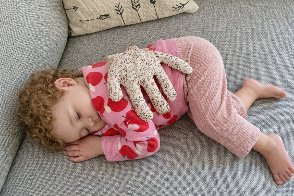 kind met bijdeHANDje warmtekussen
