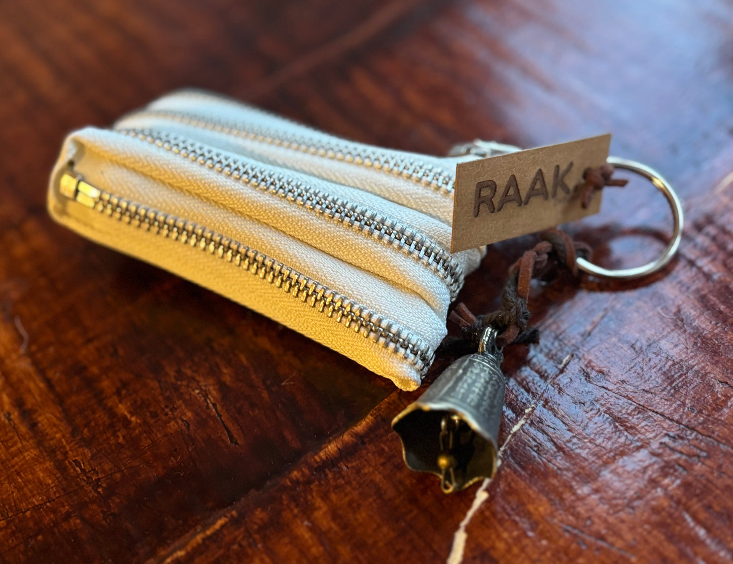 RAAK.Geldbuidel en sleutelhanger