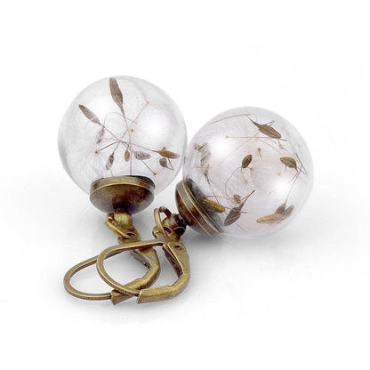 RAAK.Oorringen | PAARDEBLOEM