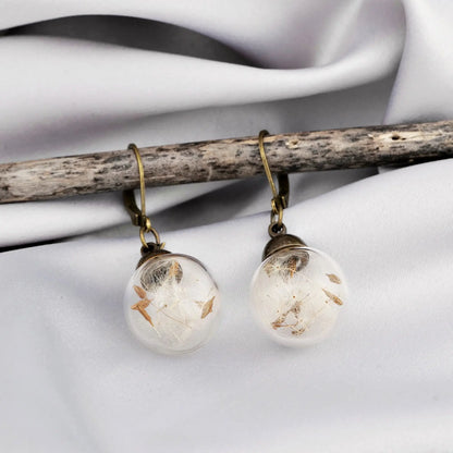 RAAK.Oorringen | PAARDEBLOEM